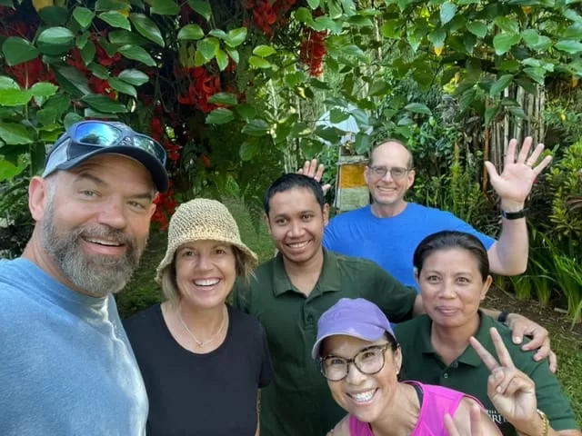 group photo in the garden at Villa Amrita