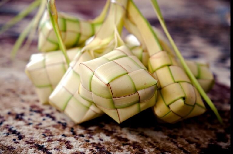 Tipat Blayag Delights with Bali’s Leaf-Wrapped Rice, Smoky Wood-Fired Aroma and Spicy Sides